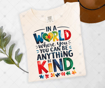 IN A WORLD WHERE YOU CAN BE ANYTHING ; BE KIND | COMFOR COLOR GRAPHIC TEE - 1493